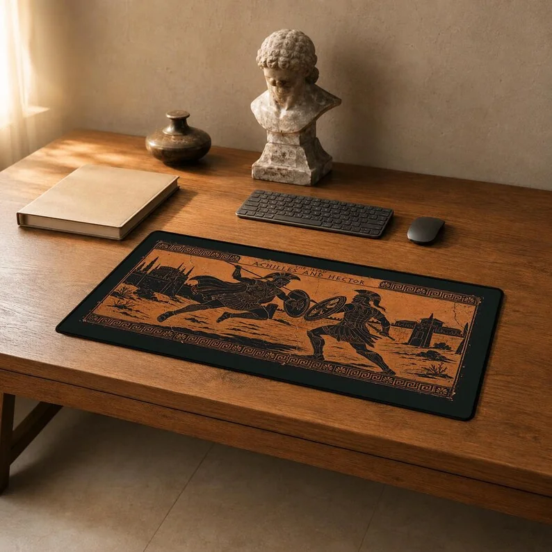 Achilles and Hector desk mat depicting the warriors in an aged Attic black-figure pottery style with warm terracotta and black decoration.